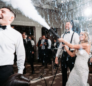 intelligent dance lighting and photo moment backdrop at upscale wedding